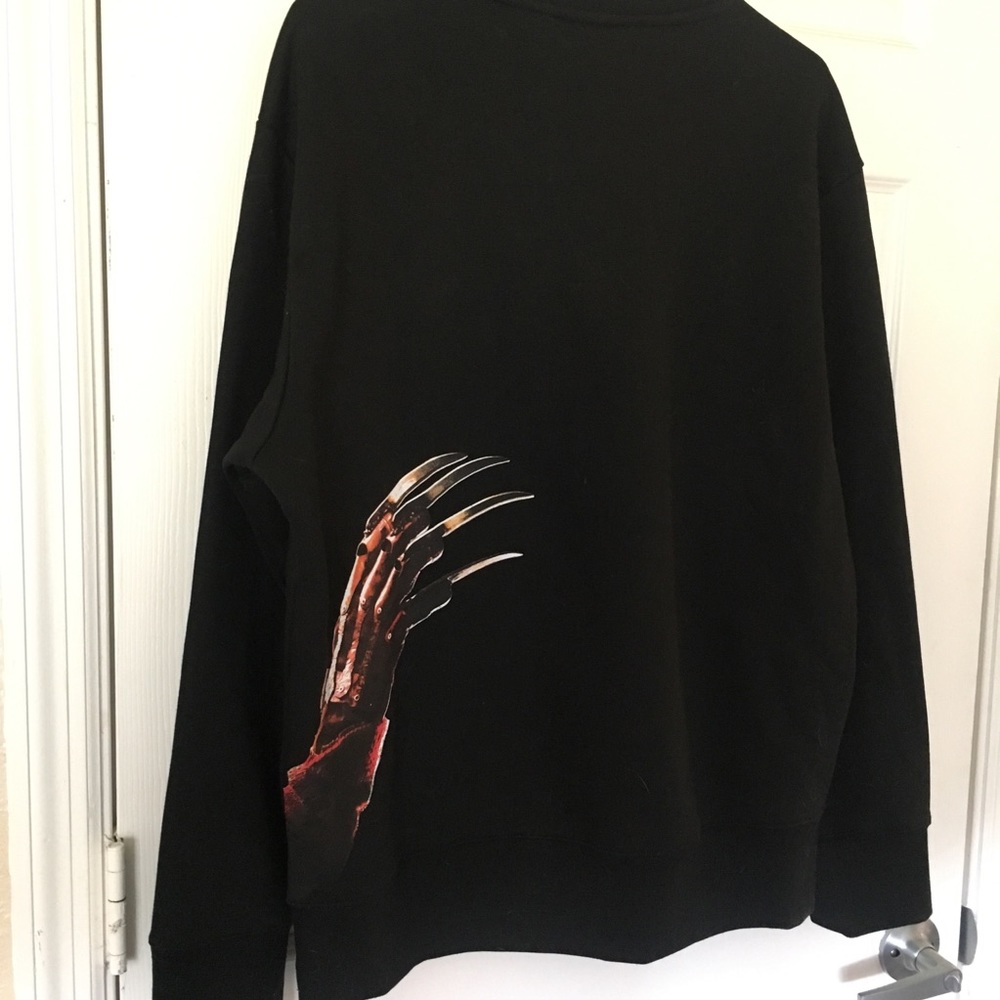 H&M A Nightmare On Elm Street crew neck sweater.